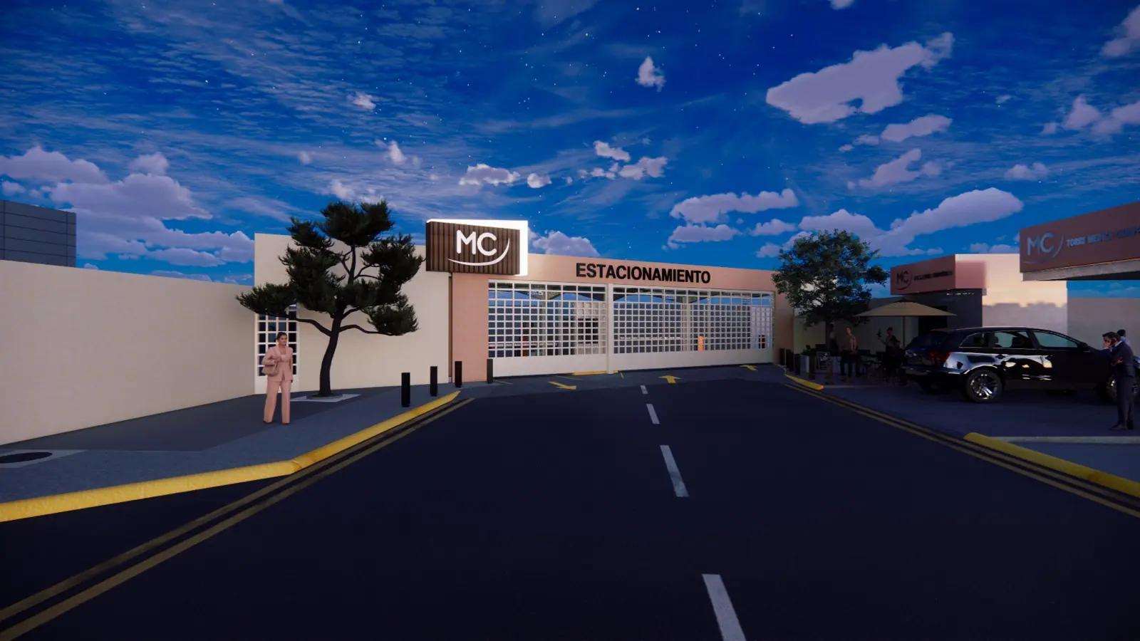 Fachada nocturna del acceso y estacionamiento del Hospital Médica Campestre